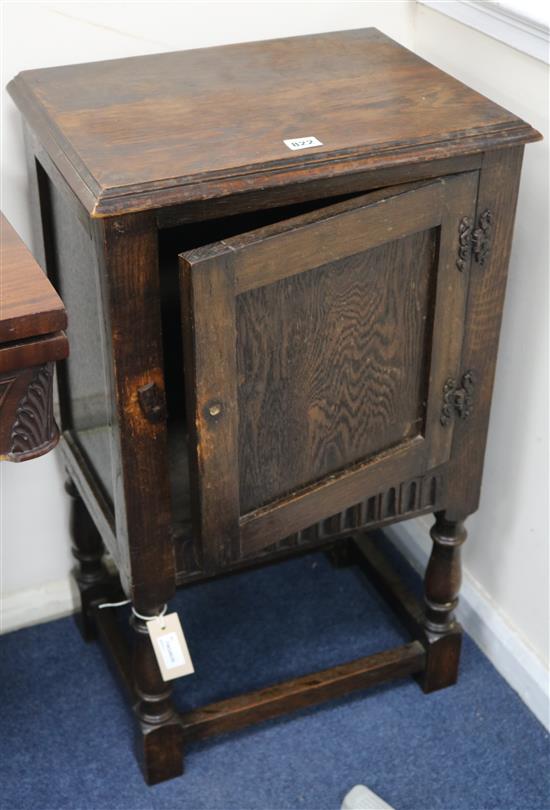 Two carved oak bedside cupboards, 1ft 6in.